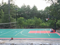 Backyard basketball court in Pembroke, MA. Whatever your sport, you could have a court surface and accessories of your own in Bolton, Berlin, Harvard, Littleton or Ayer.