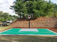 Backyard basketball court in Bridgewater, MA. Whatever Bridgewater you're in, we can make your backyard volleyball, tennis or basketball dreams happen. West Bridgewater, East Bridgewater, North Bridgewater AKA Brockton? Call Naturescape today.