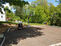 Backyard basketball court in Douglas, MA.