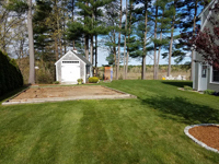 Backyard basketball court in Duxbury, MA. Volleyball, pickleball and Tennis are also available court options.