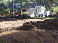 Excavation for backyard basketball court in Hanover, MA.