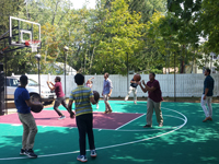 Backyard basketball court in Natick, MA.