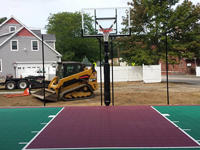 Backyard basketball court construction in Natick, MA.