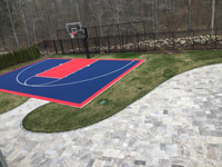 Backyard basketball court in North Attleboro, MA. We could install backyard basketball for you, too, in Attleboro, Plainville, Mansfield, Norton, or Seekonk.