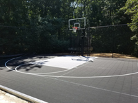 Black and grey home basketball court in Wellesley, MA.