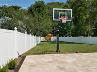 Basketball hoop system installed with a patio in Winchester, MA.