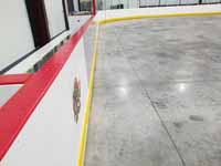We traveled to Kapolei, Hawaii and inside to resurface two inline skate hockey rinks with Versacourt Speed Indoor tile. This is a closeup of the untiled floor before we started installing the Versacourt sport surface.