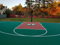 Emerald green and rust court with custom Celtics logo in Londonderry, NH.
