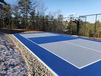 Pickleball court with basketball, in Plymouth, MA, with a tinge of snow.